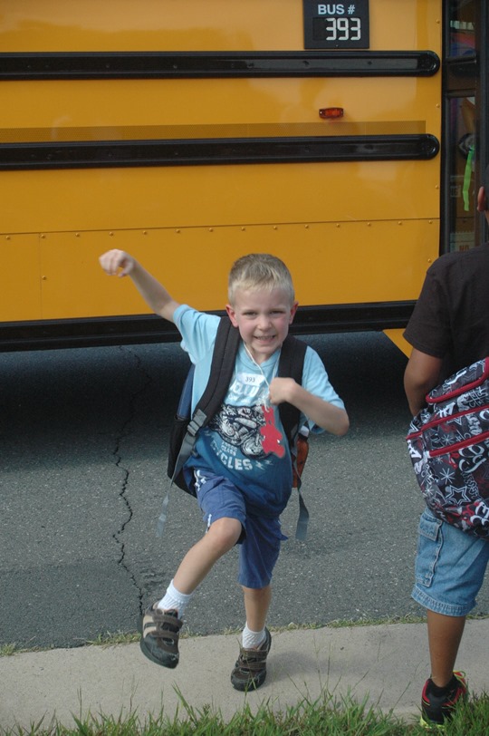 Now six-year-old Nathan returning from his first day of Kindergarten in September, 2013.  I hope his enthusiasm endures for all things academic.