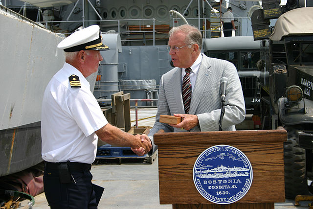 Boston, Mass. (June 17, 2005) - Special Assistant to the Secretary of the Army, Harry E. Soyster, right, presents LST Memorial Crew Captain Robert Jornlin with a World War II 60th anniversary commemoration medal, honoring the service and sacrifice of America’s World War II veterans. The vintage tank landing ship, which participated in the Normandy D-Day invasion, is docked at the Charlestown Navy Yard during Boston's Navy Week. U.S. Navy photo by Journalist 1st Class Dave Kaylor. 